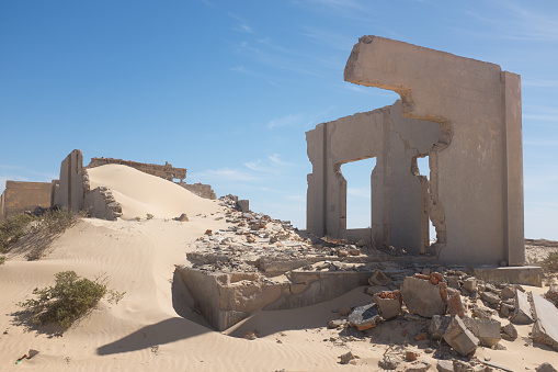 Ruins being taken back by sand dunes at an abandoned French coastal gun emplacement near Nouadhibou, Mauritania