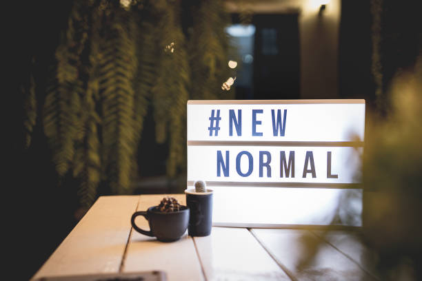 istock Lightbox sign with text hashtag #NEW NORMAL with cactus pot home decor. New normal concept. Social distancing. 1222419376