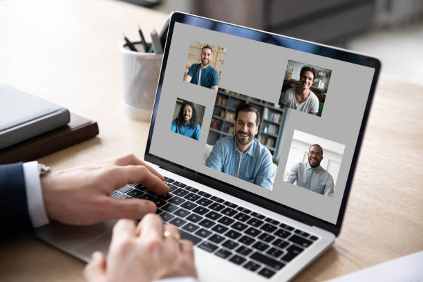 istock Male employee have webcam conference with diverse colleagues 1222422935