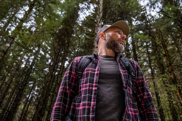istock Man Portrait in the beautiful Spruce Forest 1222423917