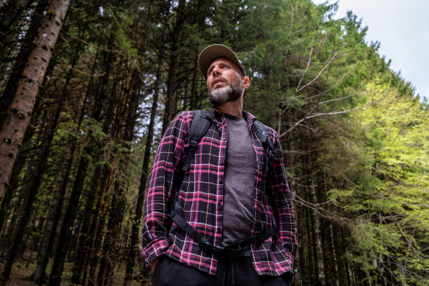 istock Man Portrait in the beautiful Spruce Forest 1222424176