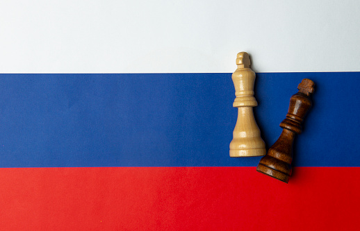 Russian strategy. Russian Flag with king chess pieces.