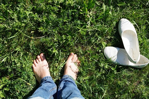 feet on the grass