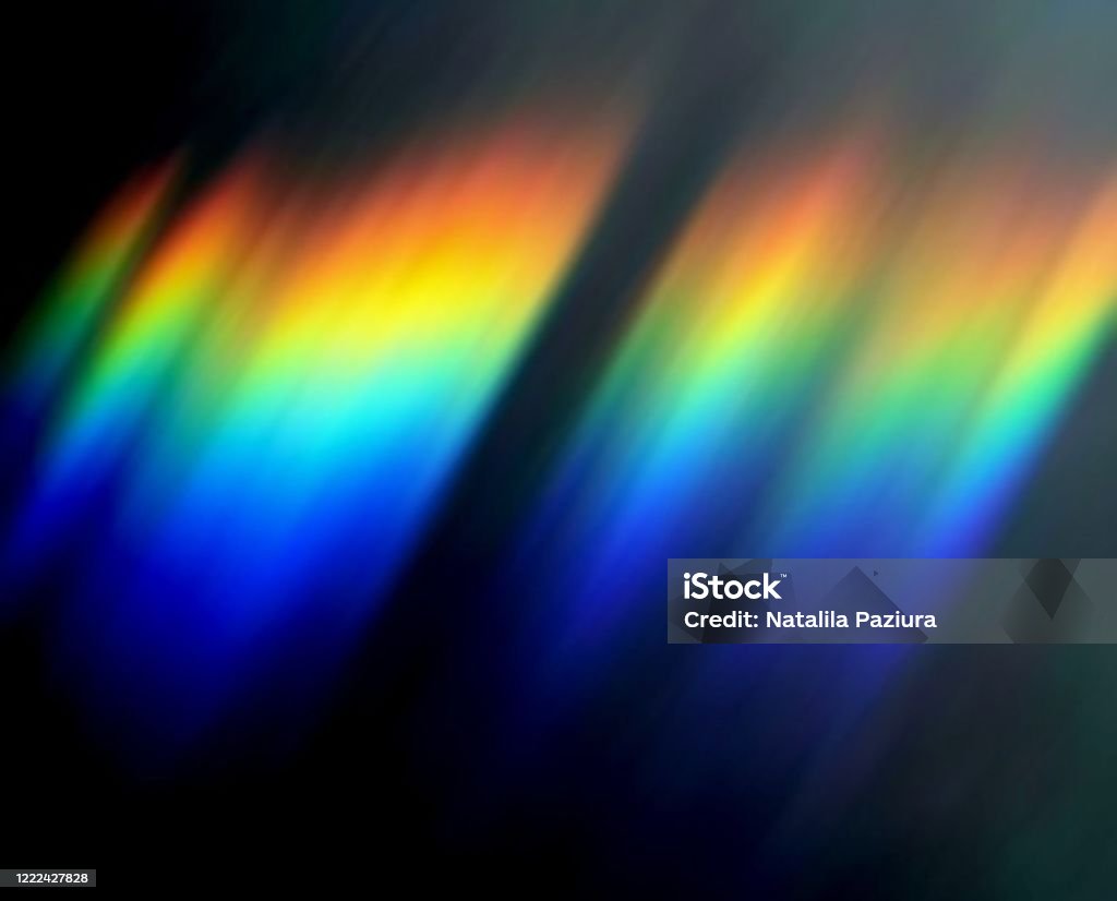 Abstract rainbow on black background. Web design. Desktop background. Lens flare. Sunbeam Abstract rainbow on black background. Web design. Desktop background. Lens flare. Sunbeam. Sunlight dispersions. Surrealistic. Abstract pattern. Rainbow on black Lens Flare Stock Photo