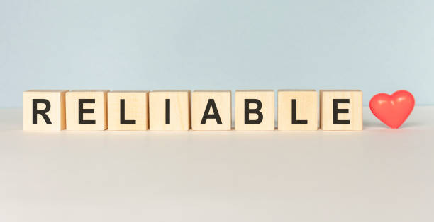 istock RELIABLE word written on wood block on a light background 1222427947