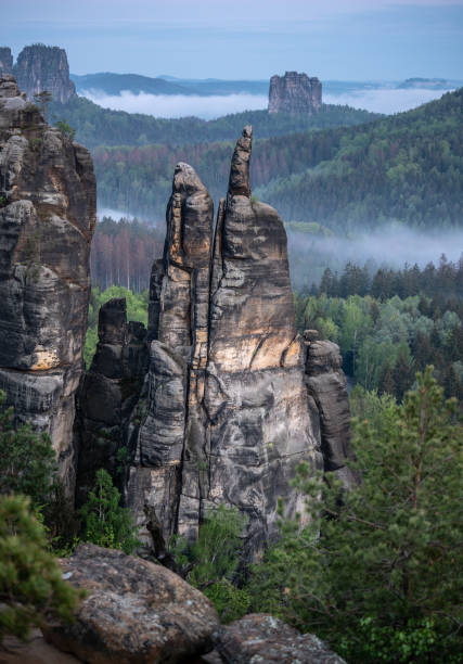 istock Sunrise Saxon switzerland, brosinnadel, saxony, germany 1222429113