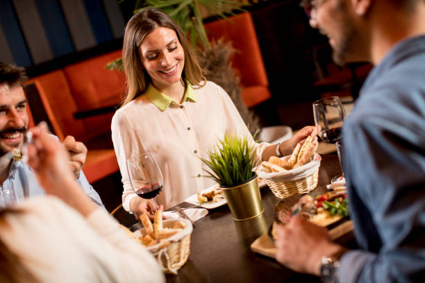 istock Young people having dinner in the restaurant 1222429328
