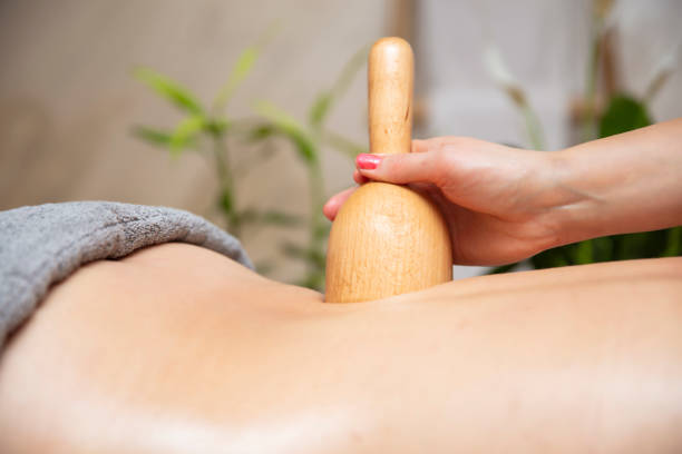 istock Maderotherapy massage with wooden swedish cup 1222430718