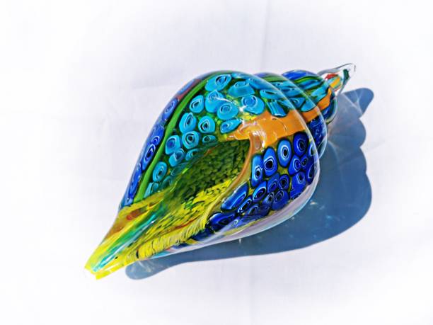 istock Colorful Glass Sea Shell Close-up isolation with white background 1222432696