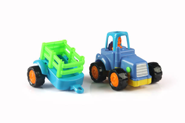 istock Toy Tractor model with the trailer on a white background 1222433726