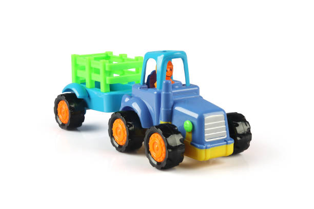 istock Toy Tractor model with the trailer on a white background 1222434496
