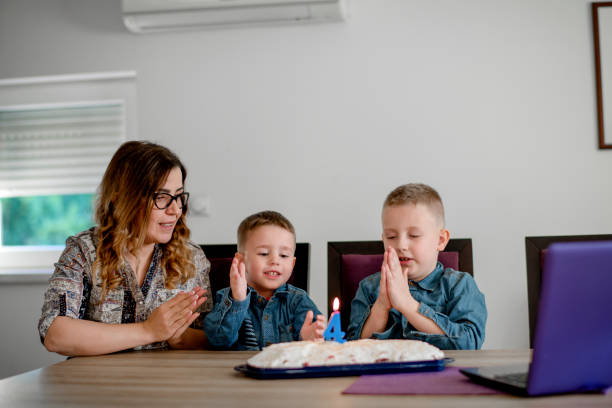 istock Family doing teleconference celebrating birthday 1222435685