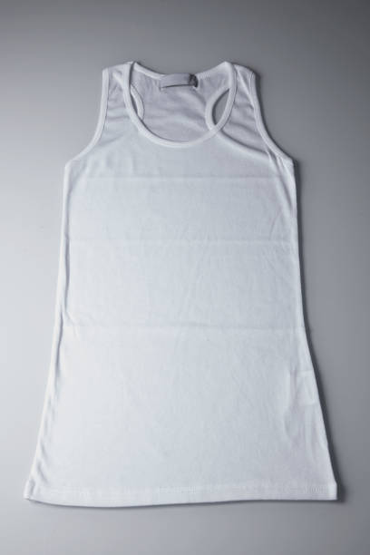 istock White sleeveless top in a gray background 1222438066