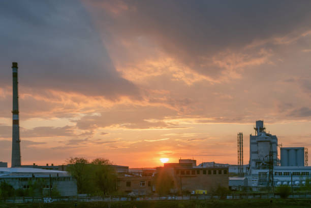istock Heavy industry factory building on sunset background 1222442162