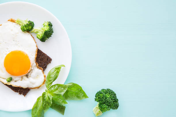 istock Tasty toast with fried eggs, copy space. 1222442301