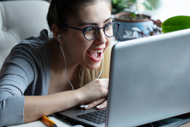 istock Beautiful young woman works at home 1222442541