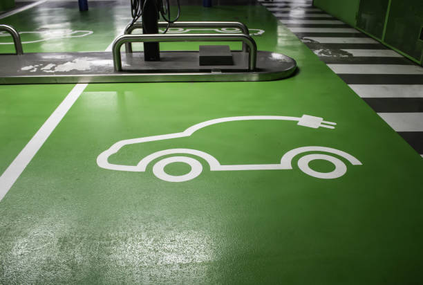 istock Sign on electric car asphalt 1222443339