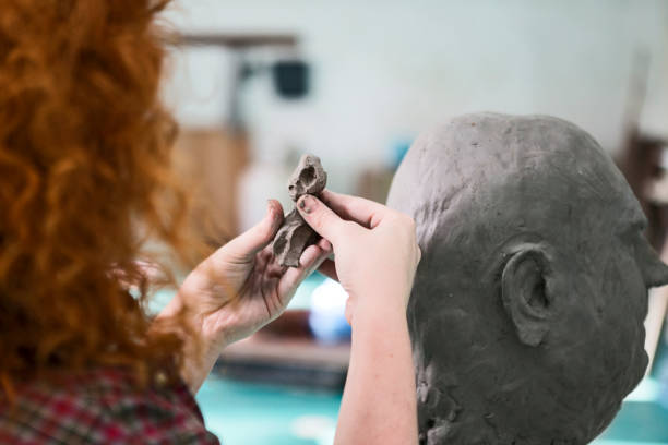 istock Holding piece of clay for my statue 1222451442