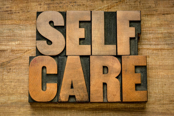 istock self care word abstract in wood type 1222452079