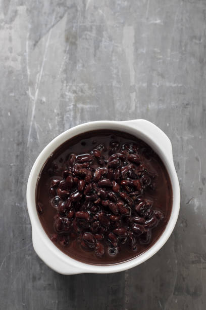 istock boiled black beans in white bowl on ceramic background 1222453068
