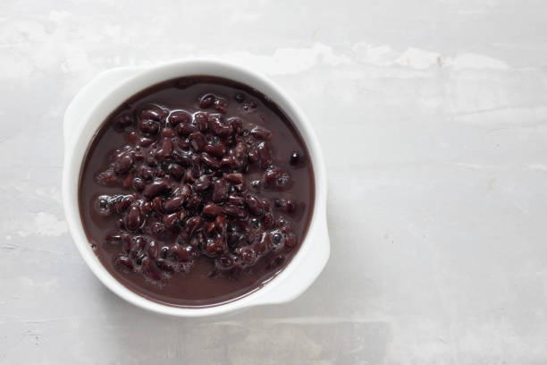 istock boiled black beans in white bowl on ceramic background 1222453073
