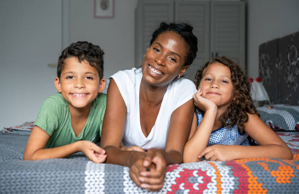 istock Cheerful mixed race family at home. 1222453887