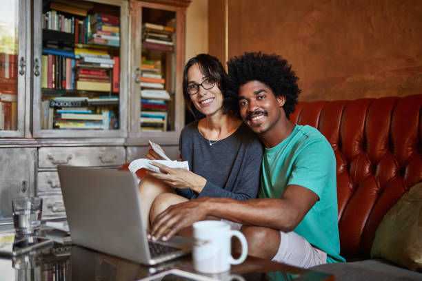 istock Multi-Ethnic Couple in 20s and 30s Managing Home Finances 1222454984