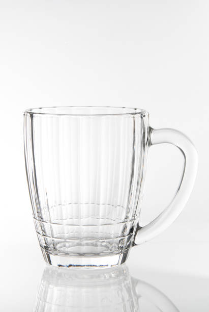 istock empty glass of draft beer isolated on white background 1222457423