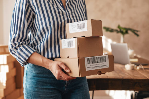 istock Women preparing a shipment as ordered stock photo 1222457470