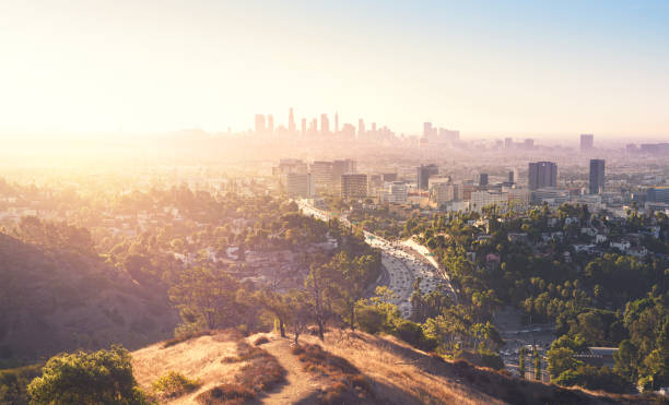 Los Angeles at foggy sunrise Los Angeles at foggy sunrise los angeles county stock pictures, royalty-free photos & images