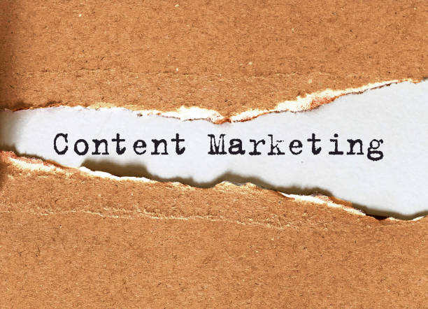 istock Hand writing Content Marketing with black marker on transparent wipe board. 1222458957