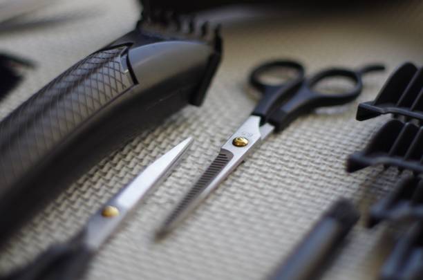 istock Working tools of barber master. Hair salon table with bokeh effect. 1222461036