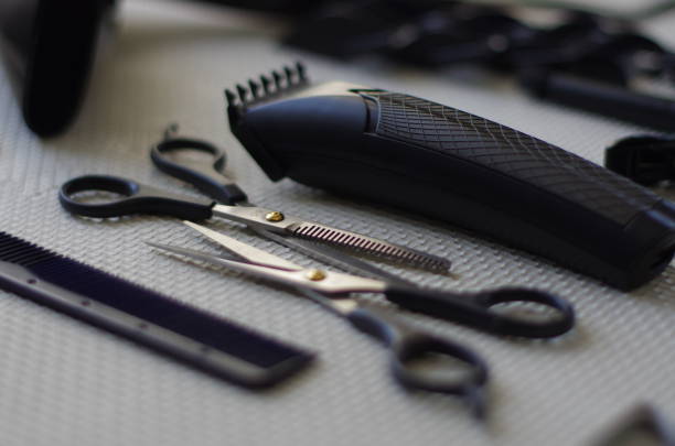 istock Working tools of barber master. Hair salon table with bokeh effect. 1222461047