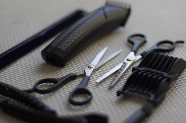 istock Working tools of barber master. Hair salon table with bokeh effect. 1222461050