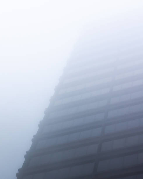 istock Office Building disappearing into the fog 1222463273