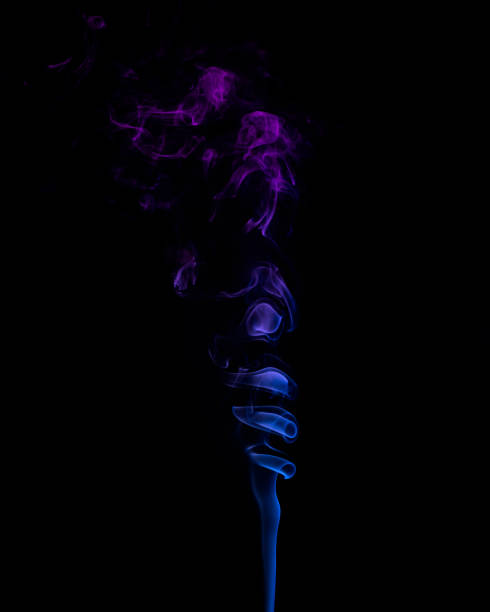istock Purple Coloured Smoke on Black Background 1222463397
