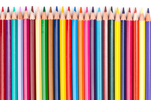 istock color pencils laid out in a row on a white background 1222467767
