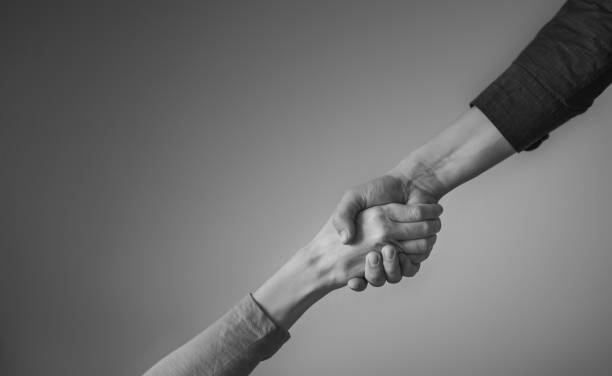 istock Person giving a helping hand. 1222467913