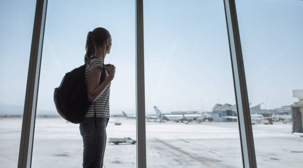 istock Woman traveler waiting for the flight. 1222468075