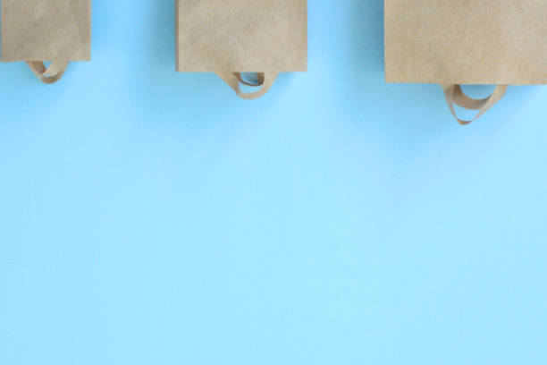 istock Abstract design element, shopping season concept,paper bag on background, top view 1222472535