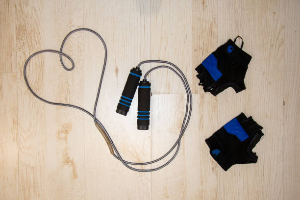 istock Gym gloves and a heart-shaped gymnastic rope 1222473536