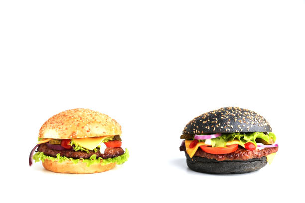 istock two classic burgers isolated on white background. 1222475935