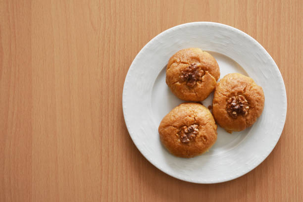 Turkish dessert, sekerpare in a white plate on the table