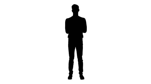 istock Silhouette Coronavirus. Man wearing protective mask cleaning his hands with sanitizer 1222478641