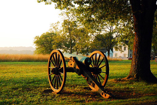 A cannon from the American at Gettysburg National Battlefield stands over the morning mist