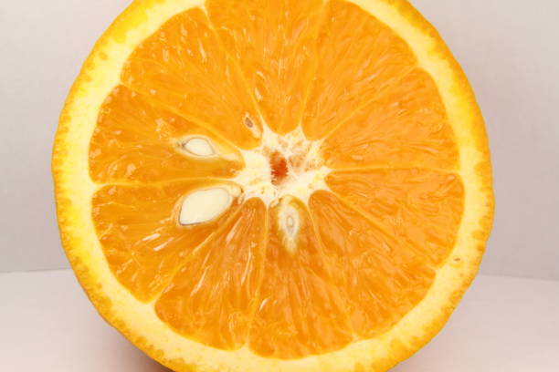 istock sliced orange on a white background 1222481919