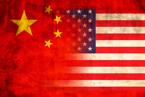 The flag of the People's Republic of China and the United Staes of America, showing a relationship concept