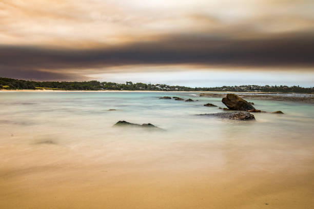 istock Thick smoke pollution over the ocean from out of control bushfire 1222483094