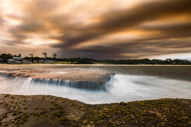istock Thick smoke pollution over the ocean from out of control bushfire 1222483632