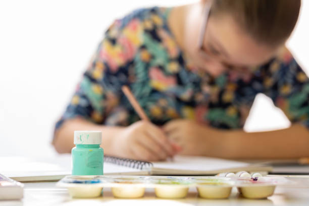 istock Close Up Of Young Girl Doing Art Class 1222486195